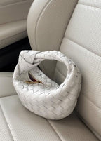 Flätsnod Neppskinn Mini Väska Med Vävt Design Och Tvinnat Handtag För Elegant Och Modern Stil